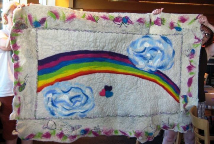 Felted rainbow Quilt with clouds and hearts